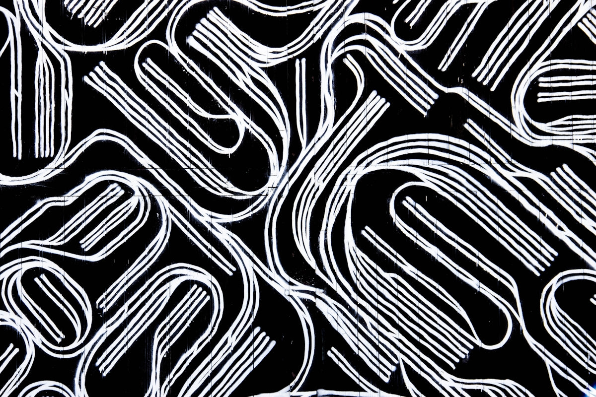 a black and white background with white lines