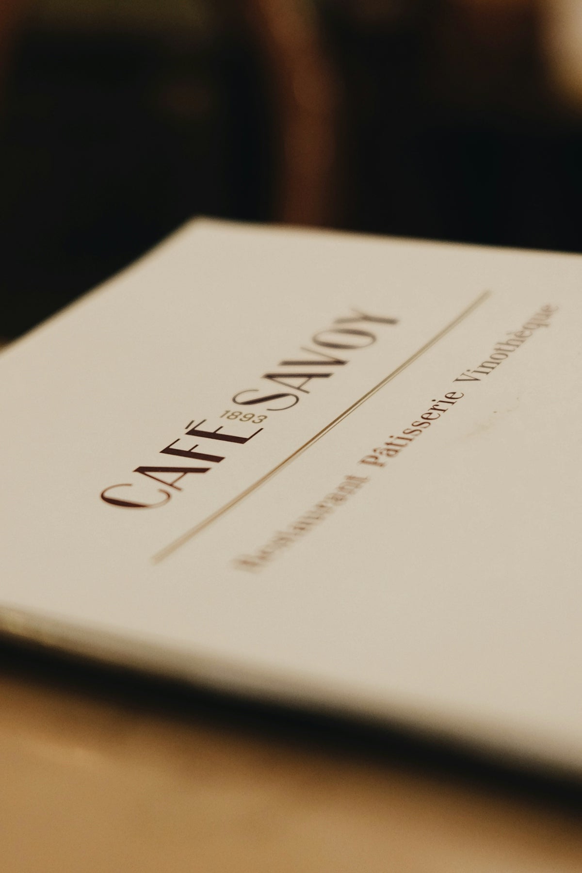 a close up of a menu on a table